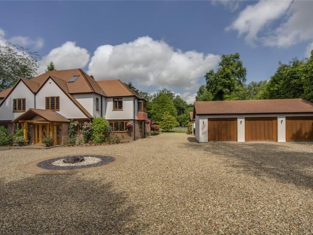 With a guide price of £2,750,000, this Bovingdon property boasts six bedrooms, five bedrooms and has immaculate interiors. It has an ornate wooden door, a terrace, landscaped gardens and a large detached annexe.