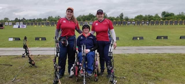 Jess Stretton pictured alongside winning team-mates Izzy Carpenter and Ella Gibson at the European Championships in Munich