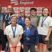 The successful squad with their medals in Sheffield.