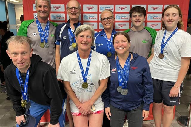 The successful squad with their medals in Sheffield.