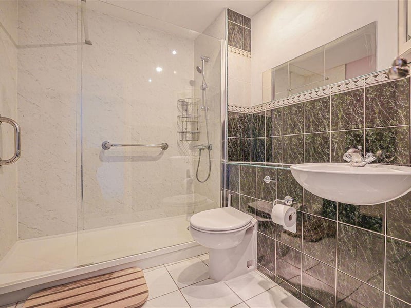 The principal double room comes with its own en suite shower room.