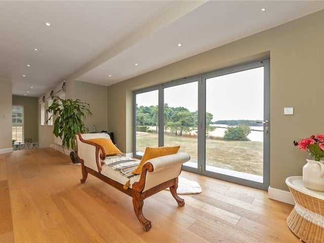 Even the hallway has beautiful views across rolling fields.