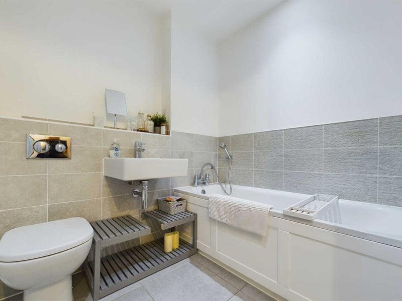 A spacious family bathroom includes a generous-sized bath