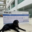 Snuggles accepts Community Fund cheque on behalf of Pets in Need Herts