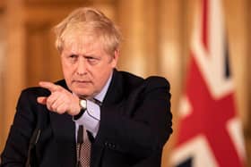 Prime Minister Boris Johnson gives a press conference on the ongoing situation with the coronavirus pandemic with chief medical officer Chris Whitty and Chief scientific officer Sir Patrick Vallance in Downing Street after he had taken part in the government's COBRA meeting on March 16 (Photo: Richard Pohle - WPA Pool/Getty Images)