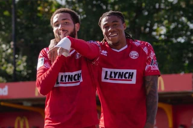 Scorer Millar Matthews-Lewis and Isiah Noel-Williams celebrate a goal on Saturday. Photo: Jemma Sear.