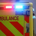 Emergency flashing lights are seen on an ambulance at Royal London Hospital (Photo by Peter Nicholls/Getty Images)
