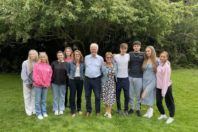 Round of applause - Stefan Anderson (principal), Elizabeth Odell (director of studies), and Dr Sarah Coren (head of sixth form) with A Level students. Image Tring Park School.