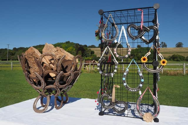 A fire pit and decorations created from recycled shoes