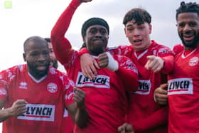 Darion Dowrich is congratulated after his goal. Photo: Jemma Sear.