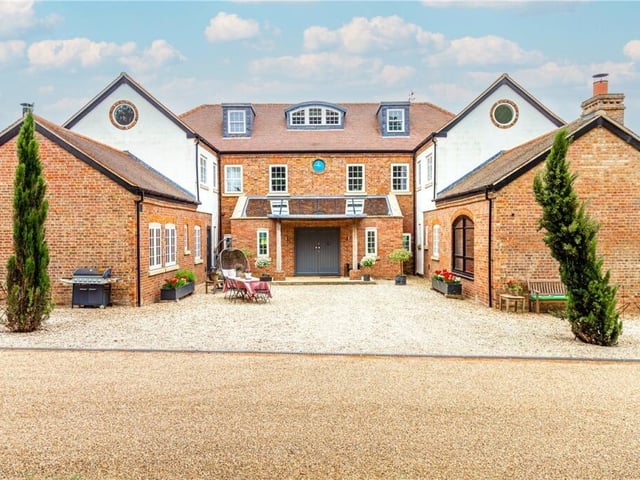 From the outside, the house is very impressive - there's space to chill out the front and storage too.
