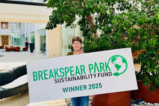 Tricia Gibbons, Founder and Director of The Green House, was presented with a cheque for £1,000 by Breakspear Park