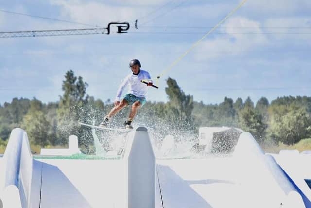 Pictured: Samuel cable wakeboarding