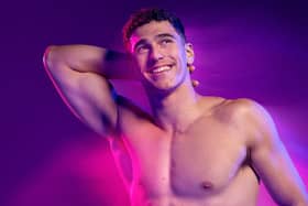 A promotional image for the show, which tells a story about male strippers