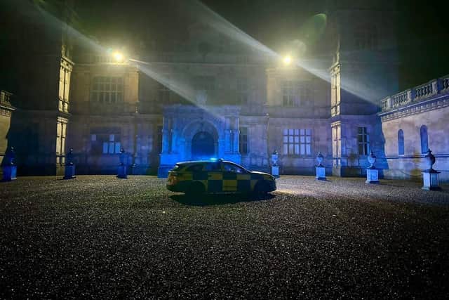 Police officers outside Mentmore Towers after an attempted break-in in 2024