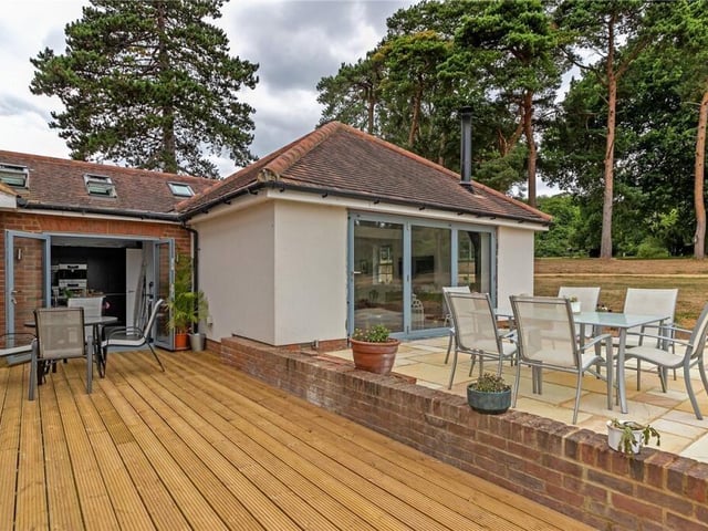 The outbuilding next to the main house has been converted into a single-storey, self-contained 'guest annexe' with its own kitchen, sitting room and two bedrooms.
