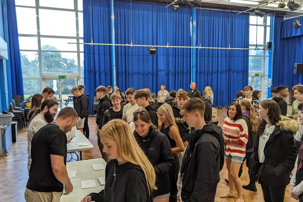 Students at The Hemel Hempstead School collect their results