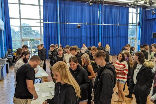 Students at The Hemel Hempstead School collect their results