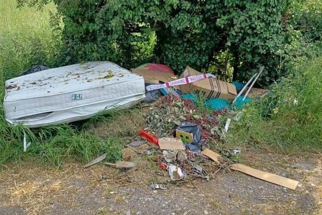 Caption Fly-tipping found on Nettleden Road, Berkhamsted. Photo: Dacorum Borough Council