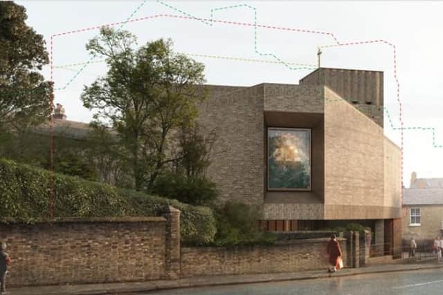 The new building is smaller than the one originally planned