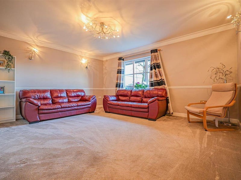 This spacious living area provides a relaxing area for all the family.