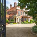 Just imagine pulling up to your gated driveway every day!