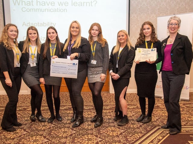 Team Dingo Dollars presenting their cheque to charity Rennie Grove Hospice Care along with their Dragon Liz Redway from Redway HR