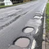 Potholes spotted in nearby Buckinghamshire used for illustrative purposes