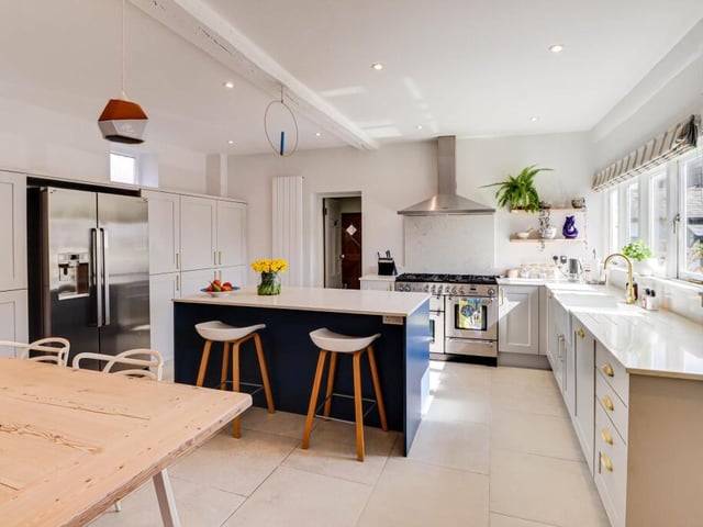 Welcome to the stunning kitchen/diner - it has fitted units, a central island, and a great sized dining area. Next to this room is the hidden utility room, so no more trying to get the washing out while the dinner is cooking!