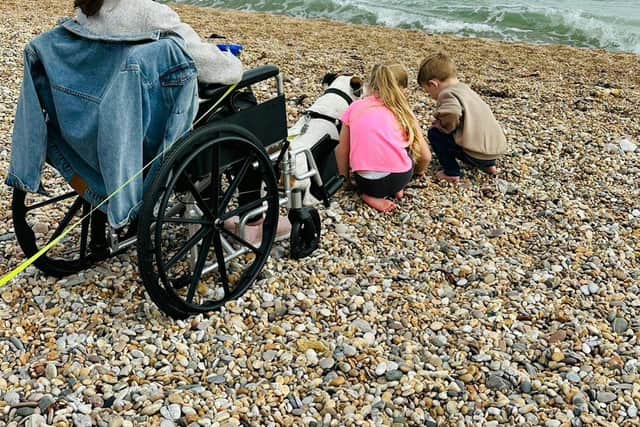 Sue and grandchildren on their family trip to Devon.