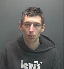 Aaron Davidson is wanted by the police