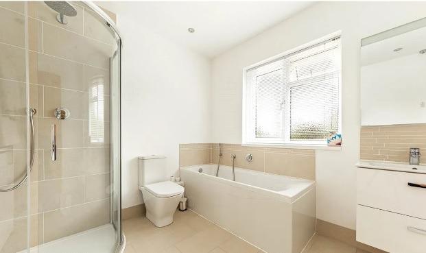 One of three bathrooms in the property, two are en-suite.