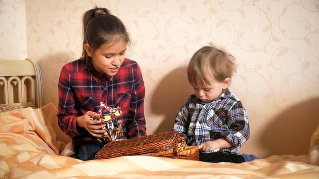 Parents differ on how old children can be before they are able to babysit younger siblings (Photo: Shutterstock)