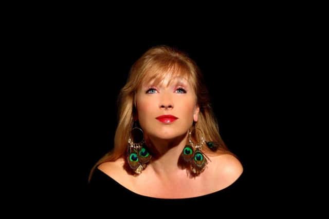 Tina May