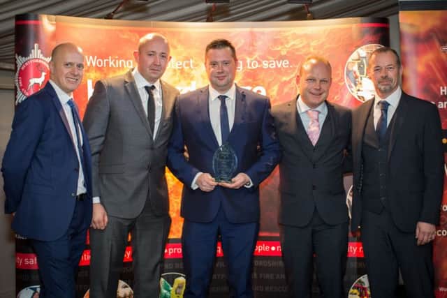 Tring firefighters receive their trophy