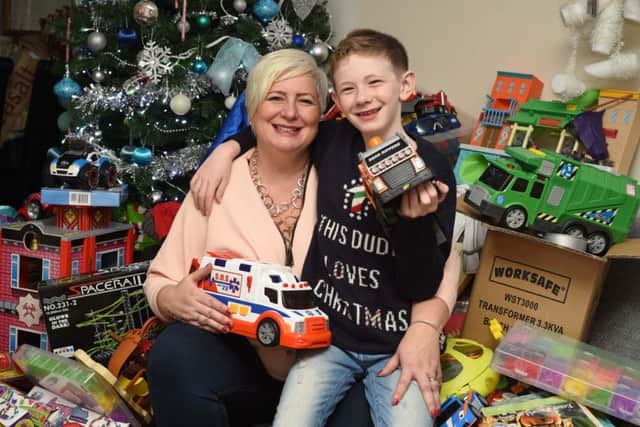 Alfie Hebborn and his mum Tracey.