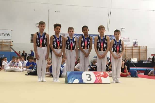 Sapphire pair Theo Potton, third from left, and Tobias Achampong, fourth from left, were part of the East Region team that won a bronze medal in the Elite Level 2 division at the national finals in Birmingham.