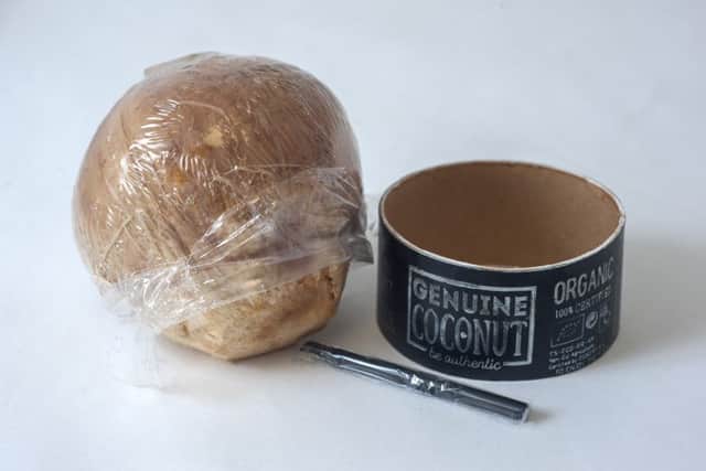 Supermarket giant under fire for wrapping organic coconuts in plastic