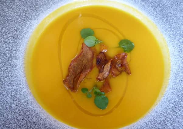 Carrot, ginger and coconut soup with a dash of coriander