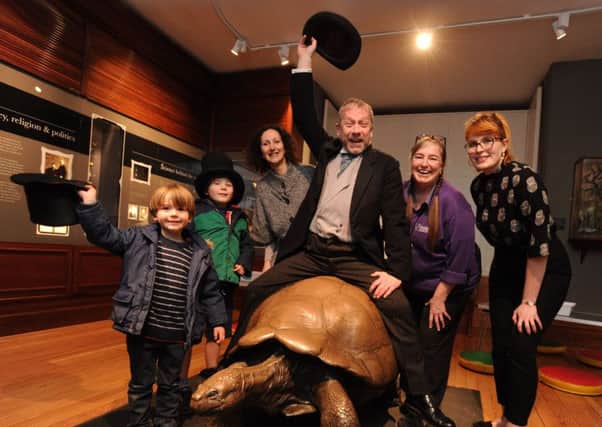 Visitors celebrate with 'Walter' at the museum in Tring. Picture by David Satchel