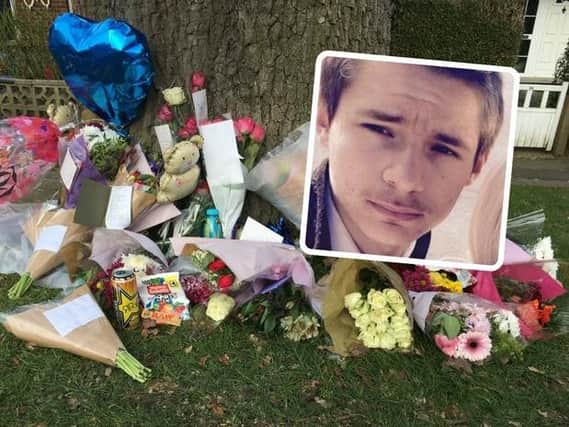 Floral tributes are left at the scene where Jordan Carter (inset) sadly passed away