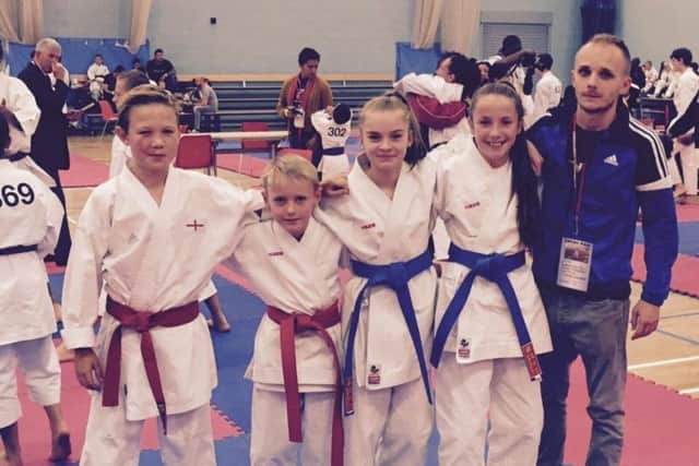 Coach Patrik Visnovsky, far right, with some of the UK team in Romania.