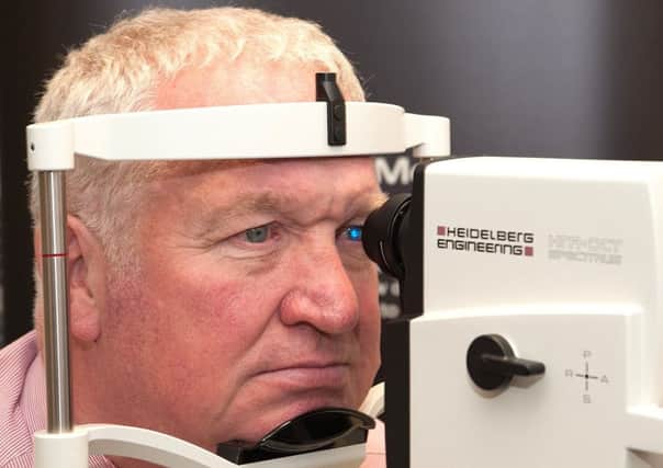 Sir Mike Penning has his eyes tested for glaucoma