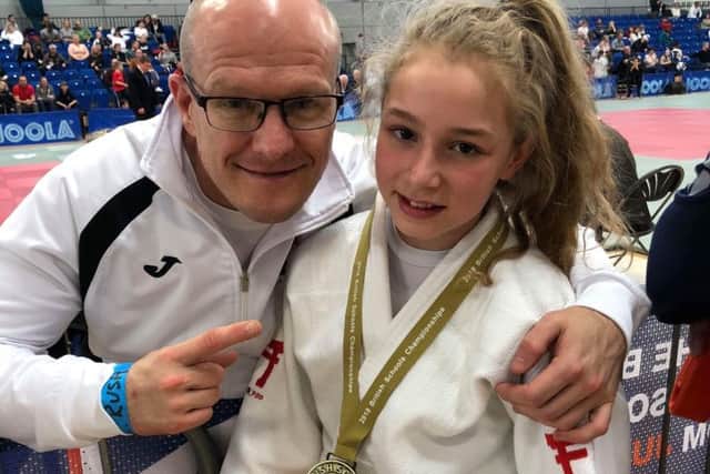 Coach Laurie Rush with gold medal winner Nicole Wood in Sheffield.