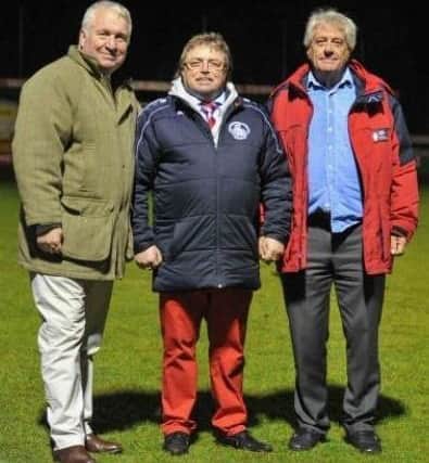 Hemel Town chairman Dave Boggins, centre, with Hemel MP Sir Mike Penning, left, and Kerry Underwood, pictured earlier this season.