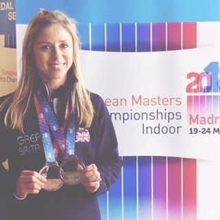 Zoe Doyle with her medals from the European Masters event.