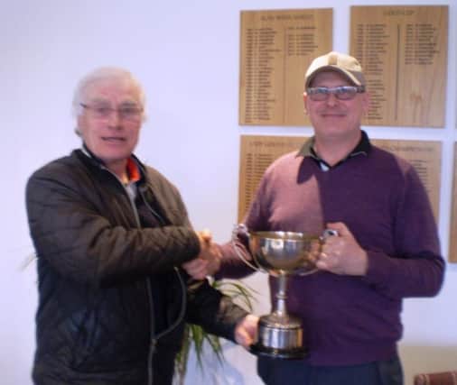 Trevor Sargent, left presents Phil Chester with the Gold Cup.