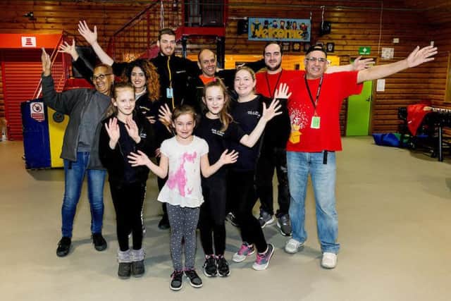 Make a Move Dance Academy founder Zoe Mackie with pupils and Amazon staff