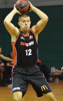 Storm's Tom Adorian had an outstanding display with 11 points and ten boards. (Pictures by Lin Titmuss).