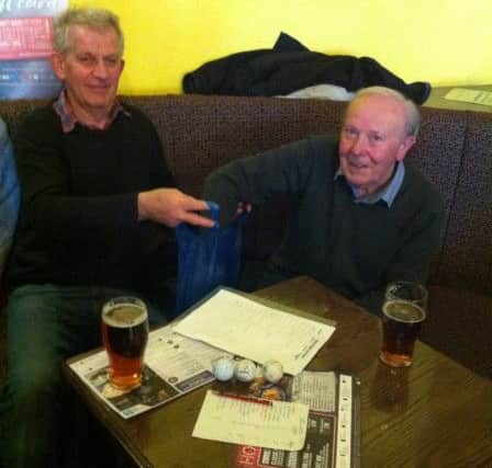 The schedule for this years competition being drawn by Caradoc Bevan, left, and Dick Harding. (Picture by Colin Murdoch).